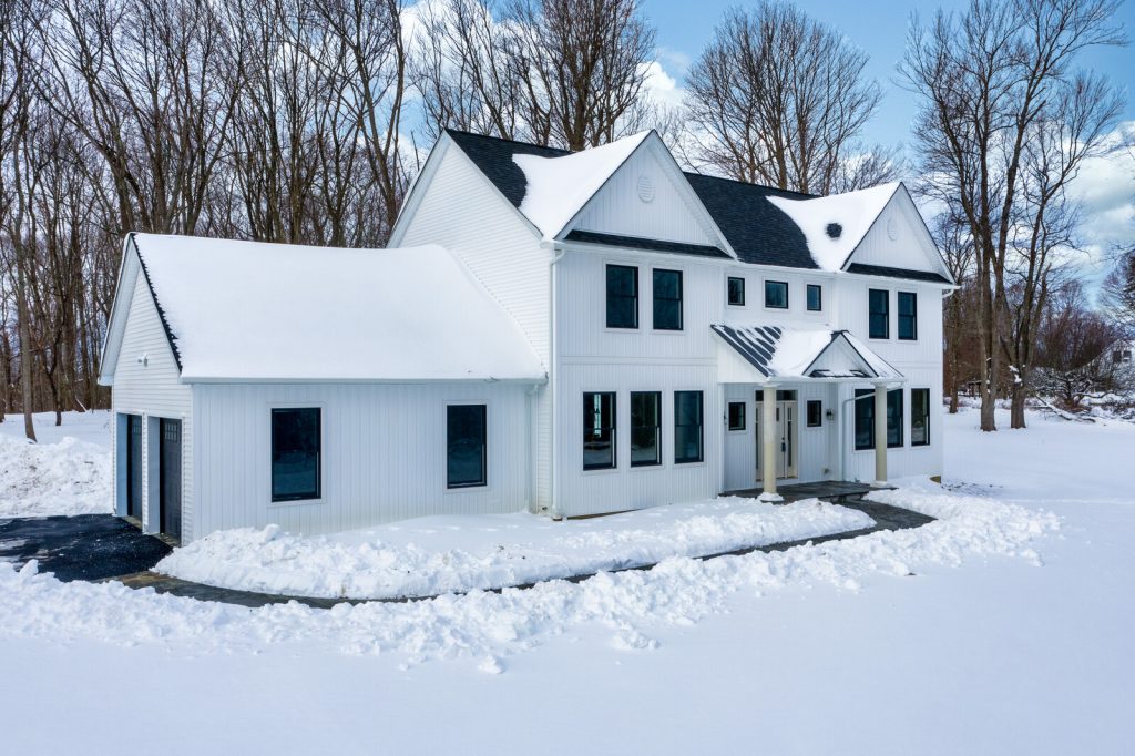modular home covered in snow